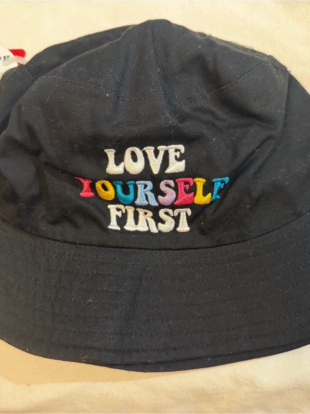 Alara Black Bucket Hat with Multicolor 'Love Yourself First' Embroidery